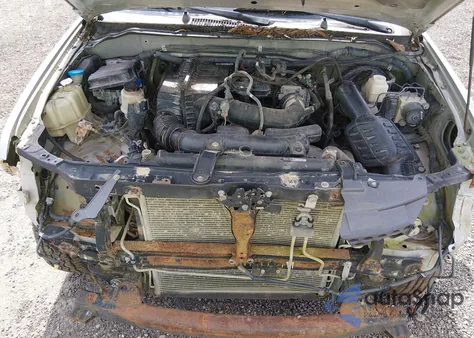 2009 Suzuki Equator Premium z USA, uszkodzony, nr VIN 5Z6BD06T29C414604